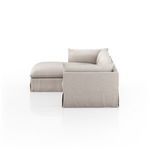 Side angle focused on back and side slipcover fabric and cushion support