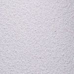 Close-up of textured white linen fabric showing fine woven details on scalloped shade