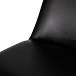 Close-up of leather upholstery on seat and backrest showing smooth finish