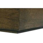 Close-up of table side with dark wood grain lines and natural sheen