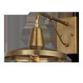 Mariner Outdoor Wall Sconce in antique brass finish with geometric design and wide circular shade