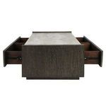 Back view of coffee table with side drawers fully extended revealing dark wood interiors and textured reclaimed wood back