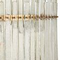 Side perspective highlighting vertical attachment of textured glass bars to thin antique brass rings