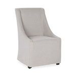 Warwick Upholstered Rolling Dining Chair in neutral gray with sloping arms and castors for mobility