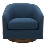 Oscy Swivel Chair in deep blue fabric with rounded back and brass-colored circular swivel base