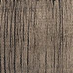 Macro view of wool texture highlighting intricate handwoven vertical black and beige lines