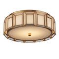 Side perspective displaying geometric pattern of milk glass panels framed in brass metal