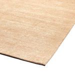 Low-angle view showing rug edge and thin profile in beige