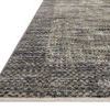 Soho Multi / Slate Rug angled close-up showing thin fringe edges and detailed pattern on lay flat floor