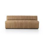 Armless dining banquette with tan top-grain leather featuring pronounced linear channeling