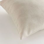 Close-up view emphasizing the woven texture and fine Jacquard pattern on the pillow fabric