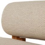 Back view of chaise showcasing teak wood frame and backrest cushions from behind