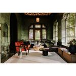 Living room featuring Aulo Coffee Table alongside wooden table, red chairs, and stained glass windows