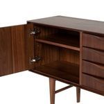 Open left side cabinet door showing adjustable shelf and metal hinges inside the Elisabeth Sideboard