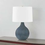 Side angle of Nepperhand table lamp showing the curved gourd-shaped base and shade profile