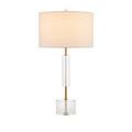 Full front view of Deville Table Lamp against white background highlighting crystal base and brass details