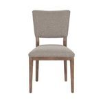 Straight-on side view of a Phillip Dining Chair showing profile of seat and backrest with wooden legs