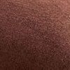 Close-up texture of cinnamon red velvet fabric showing soft, plush pile