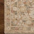 Detailed view of rug border with soft fringe on a wooden floor background