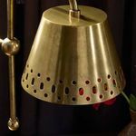 Interior room setting with Vesper Table Lamp on wood bedside table with flowers and curtains