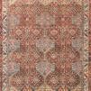 Loren Spice Multi Rug with vintage hand-knotted look featuring red, blue, beige, and brown geometric patterns