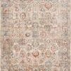 Traditional power-loomed rug with abstract and traditional motifs in ivory, ocean blue, rust, and muted gold tones