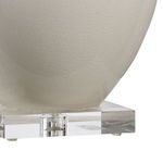 Close-up of cream crackle glaze ceramic texture and clear acrylic base of Fulton Vase Lamp