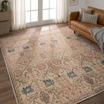 Rust and cream trellis rug in living room setting with natural light from window and leather sofa