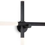 Cass Sconce close-up focused on horizontal black metal arm and frosted acrylic light tube