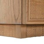 Close-up of desk corner showing textured rattan woven details on base and side