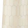 Detailed view of the bone picket-tile pattern on the stem portion of the Osa Drinks Table