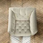 Top-down view of Nicolla Chair revealing deep button tufting pattern on seat and inner arms