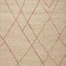 Ivory and natural geometric-patterned jute rug with linear and braided design details