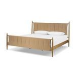 Three-quarter angle view showing side wood frame and woven headboard and footboard of Richard Bed