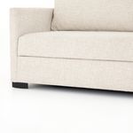 Bed surface close-up of fully unfolded sofa bed showing flat mattress area