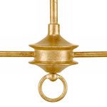 Detail of the central small cog and ornamental ring with textured gold leaf finish