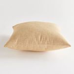 Flat side profile of Gage pillow emphasizing its thickness and woven texture