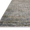 Edge view of Soho Charcoal rug showing thin white fringe and flat woven border detail