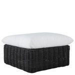 Angle showing white cushion on dark wicker ottoman, highlighting dimensions and profile