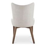 Back view of Posta dining chair showing curved high backrest and tapered wooden legs
