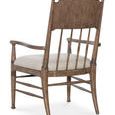 Rear angle view showing carved spindle back and gently curved armrests of Americana arm chair
