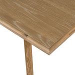 Top corner close-up of rectangular oak tabletop with visible grain and white wash finish