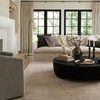 Living room view of Arden rug capturing more of the beige and gray ribbed pattern under furniture