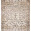 Gray and gold vintage style rug with ornate central medallion in cream, silver, and muted metallic hues
