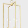 Pendant light shown from slight left angle highlighting geometric frame and bulb arrangement