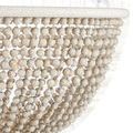 Bottom-close view focusing on the layered strands of sandstone beads and circular base ring wrapped in twine