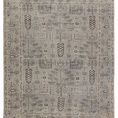 Hand-knotted oriental gray rug with traditional intricate floral and geometric motifs in tonal shades