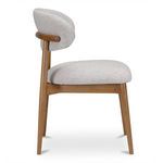 Side view of Ellie Dining Chair highlighting thickness of cushioned seat and backrest
