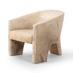 Angled side view of chair with slightly darker shade on front leg and seat area