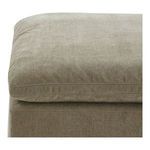 Close-up of the ottoman's moisture-repellent, textured taupe fabric and piped edge detailing